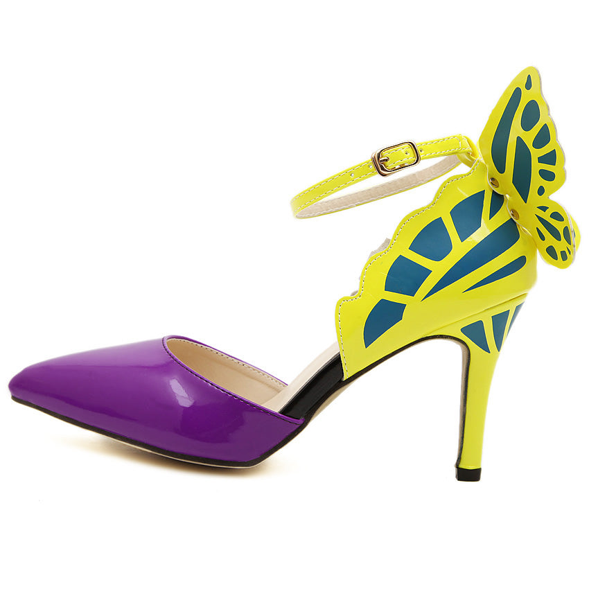 Woman with yellow and pink high heel butterfly shoes before Salvatore  Ferragamo fashion show, Milan Fashion Week street style Stock Photo - Alamy