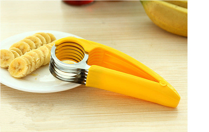 https://www.freedomlook.com/cdn/shop/products/Popular-Kitchen-utensils-Accessories-Banana-Slicer-Chopper-Fruit-Cutter-Cucumber-sausage-Peeler-new-Cooking-Tool-Home_37dcb39f-bb9f-4ae4-ba11-f21c7e4cc7e7.jpg?v=1571709025