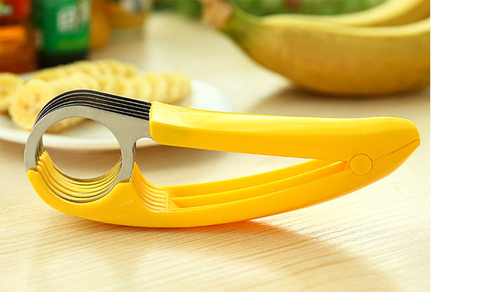 https://www.freedomlook.com/cdn/shop/products/Popular-Kitchen-utensils-Accessories-Banana-Slicer-Chopper-Fruit-Cutter-Cucumber-sausage-Peeler-new-Cooking-Tool-Home_d2286bef-46ec-4cf3-80d1-087251a77144.jpg?v=1571709025